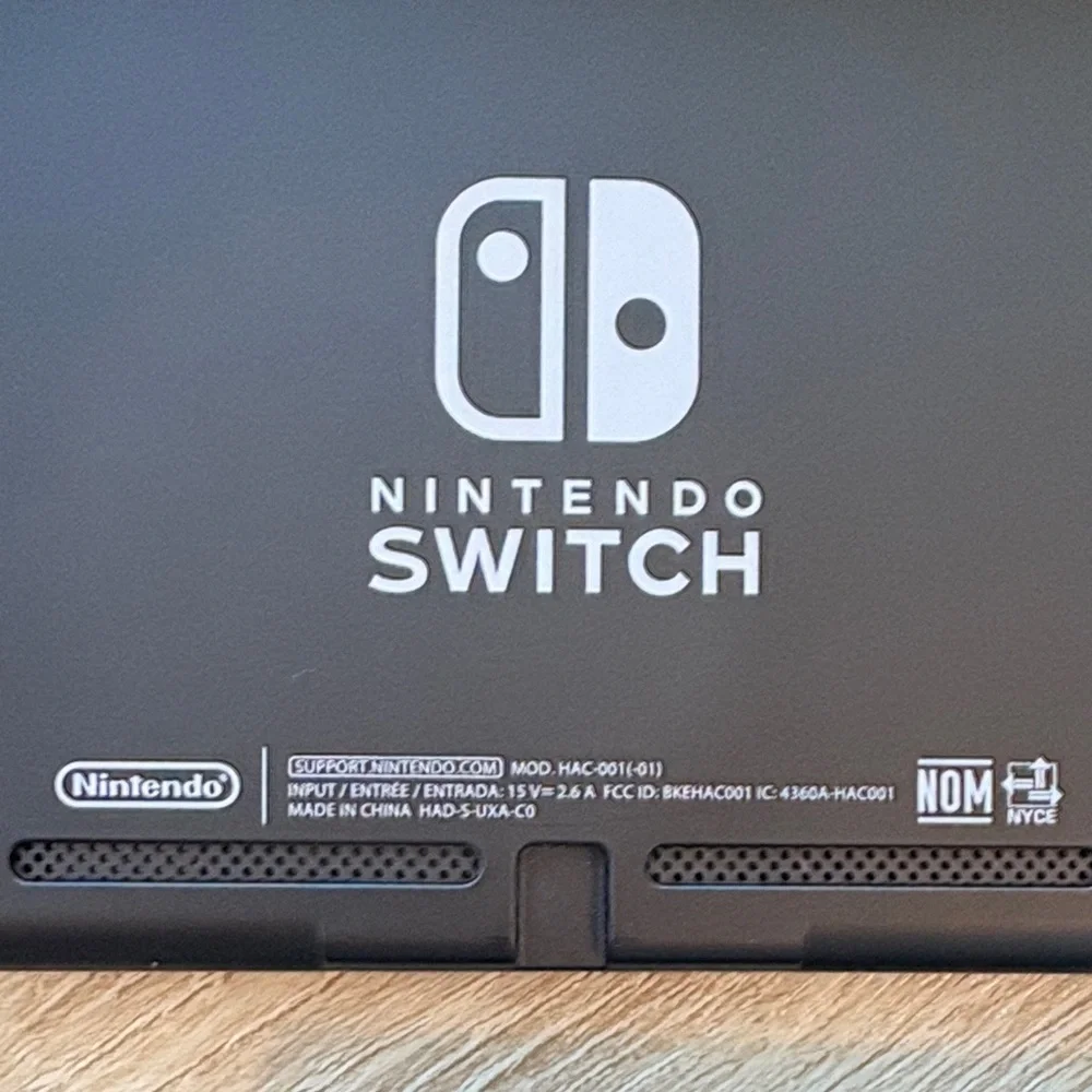 Complete Nintendo Switch Console + 2-Pc Racing Wheels Set ($10 value) - Picture 3 of 7